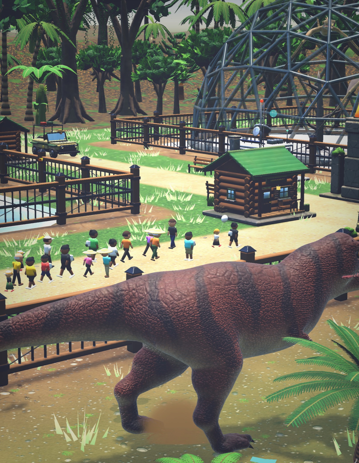 A T. rex walks its enclosure as a crowd of guests passes by